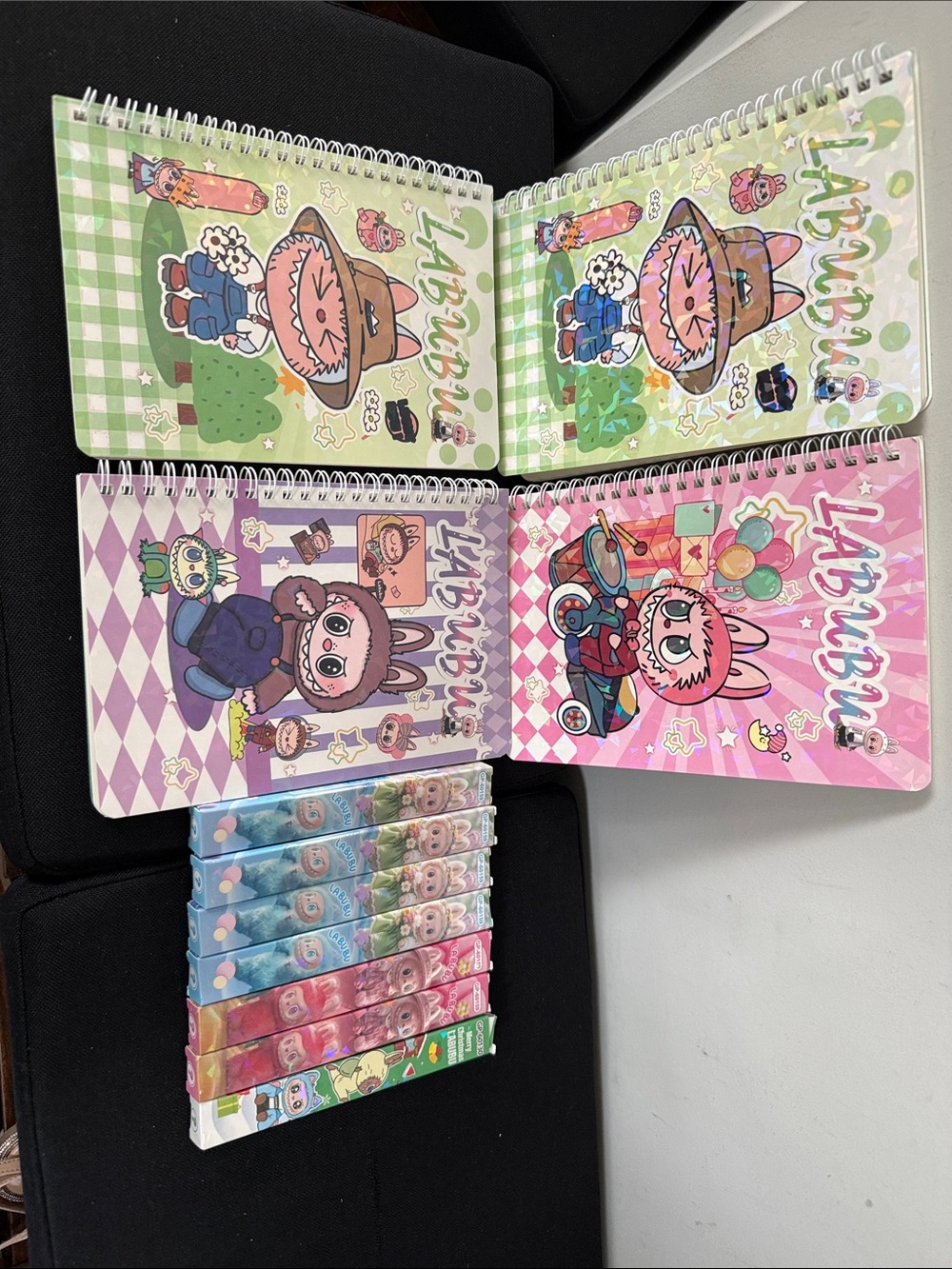 Cute Labubu Spiral Notebooks - Pink, Green, Purple, with 7 blind box pens.